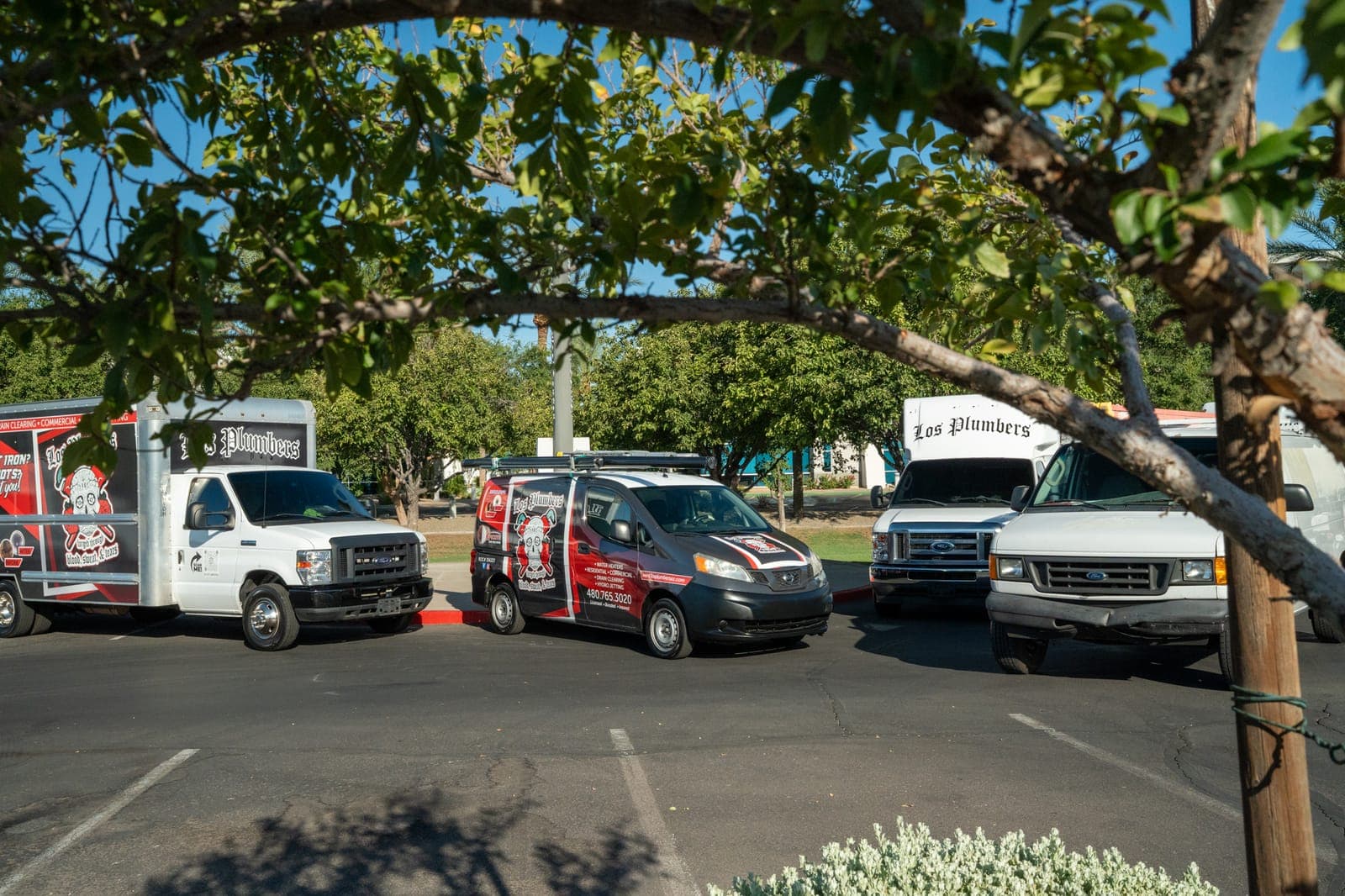 The Los Plumbers team and service fleet in Mesa, Arizona