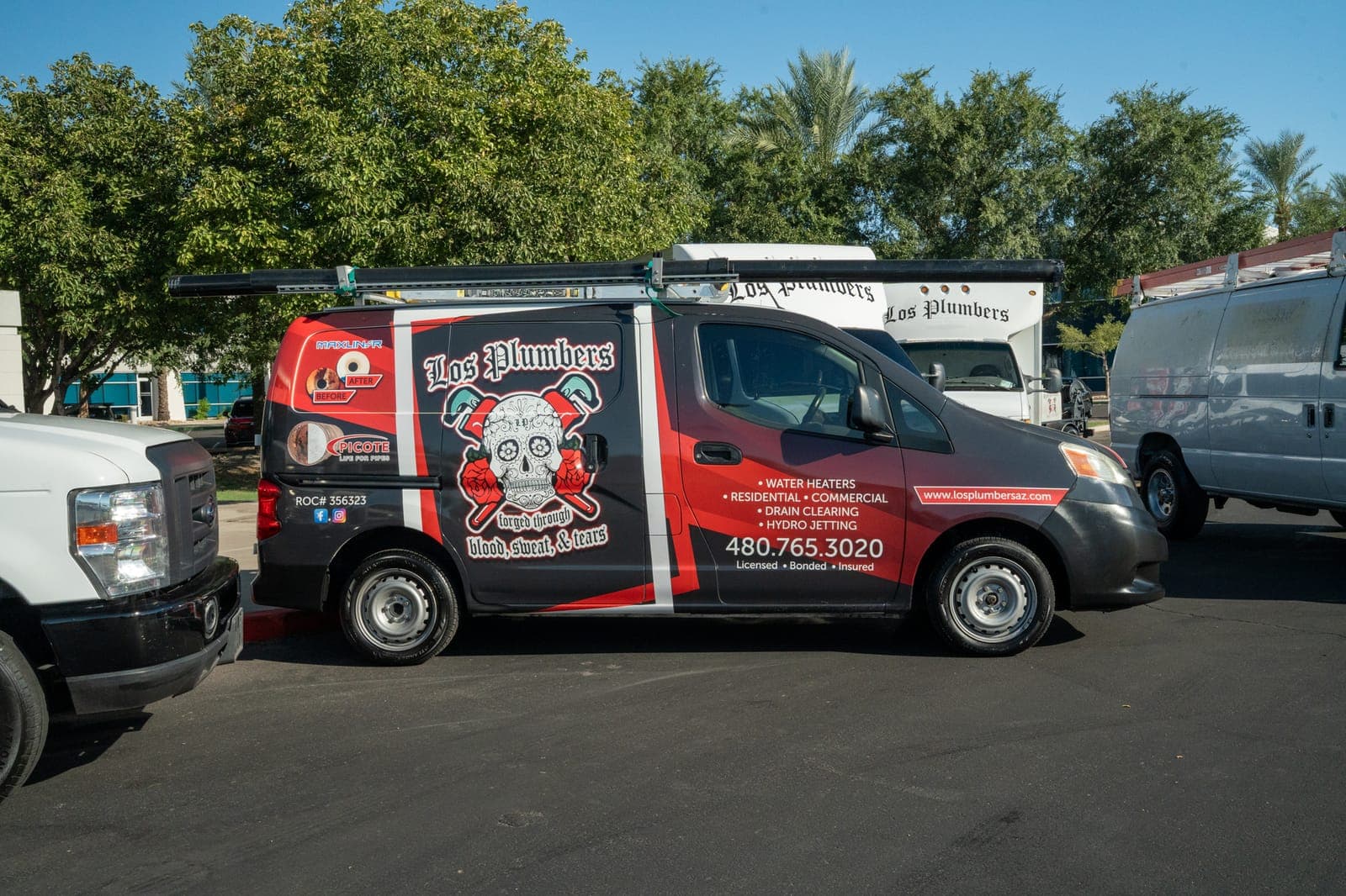 The Los Plumbers team and service fleet in Mesa, Arizona